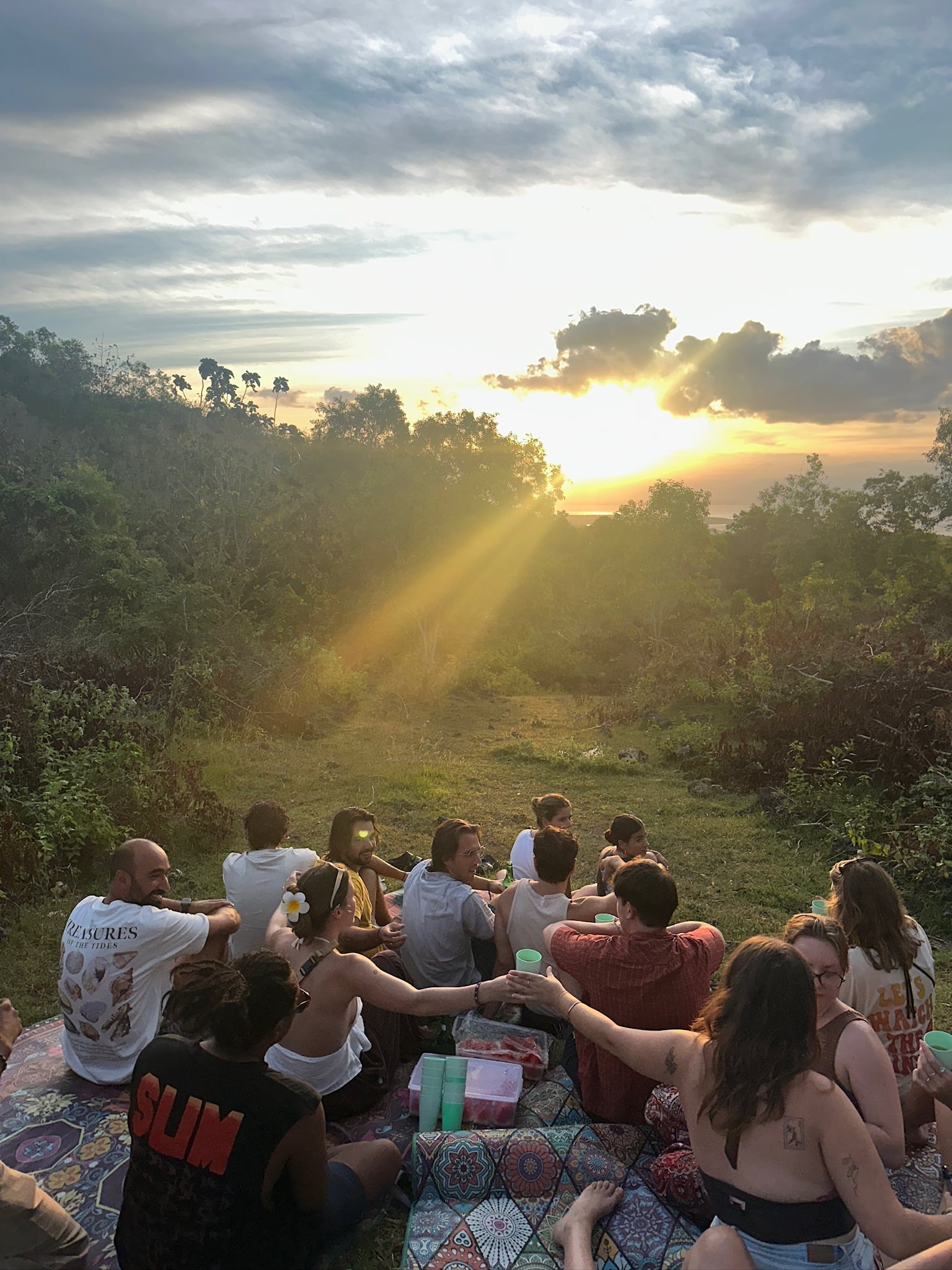 Guests sharing a sunset gathering at The Penida Project