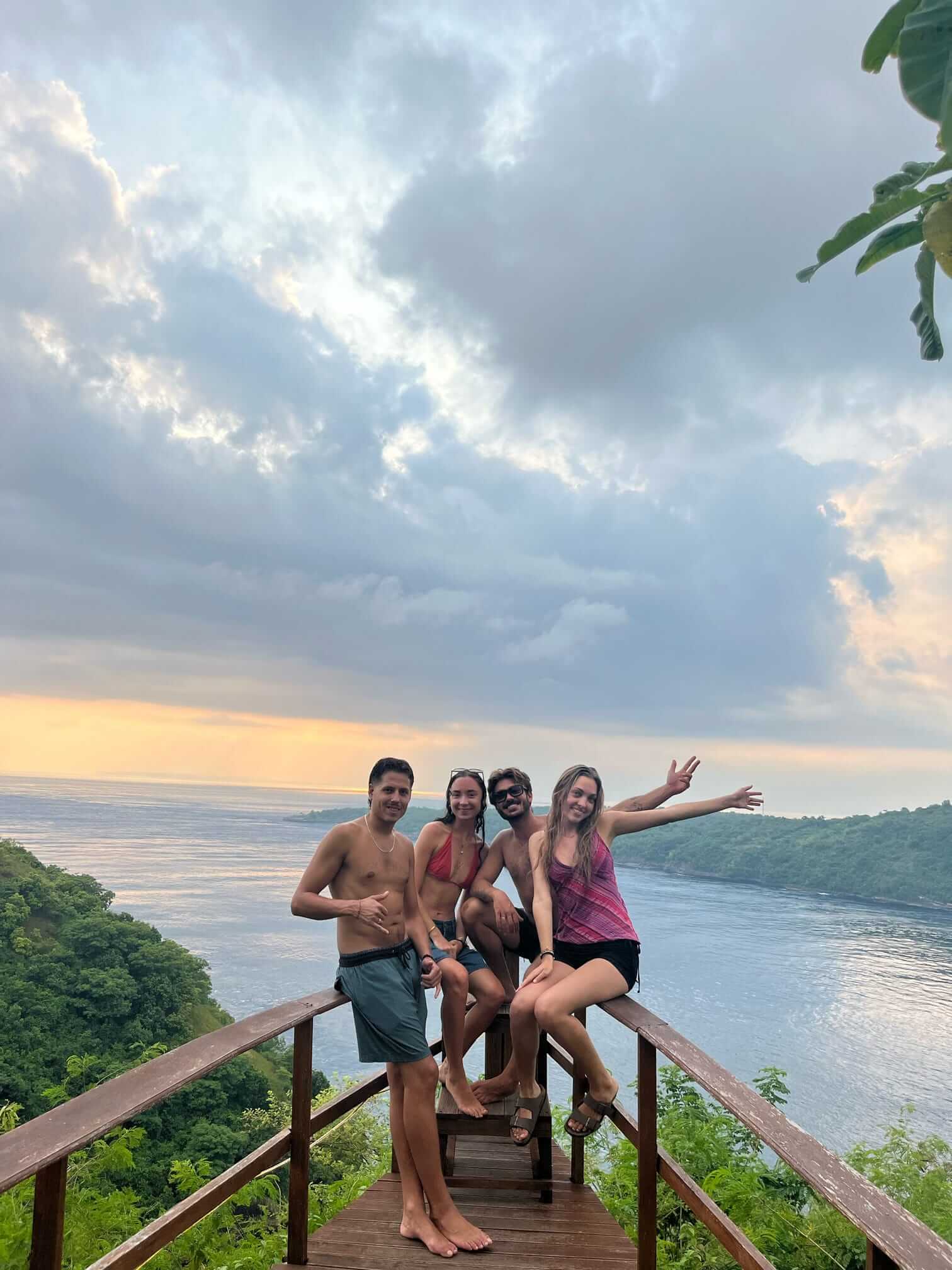 Guests and volunteers enjoying sunset at Crystal Bay