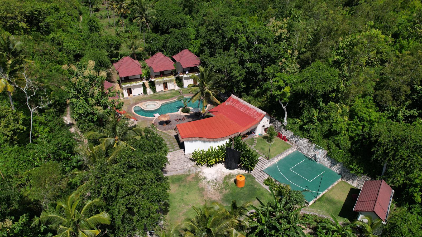 The Penida Project hostel buildings and jungle garden in Nusa Penida
