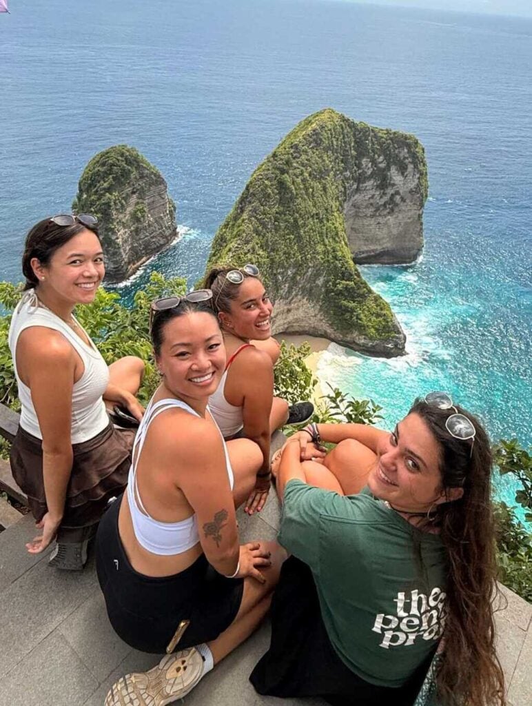 Traveller overlooking the Nusa Penida coast during an island tour